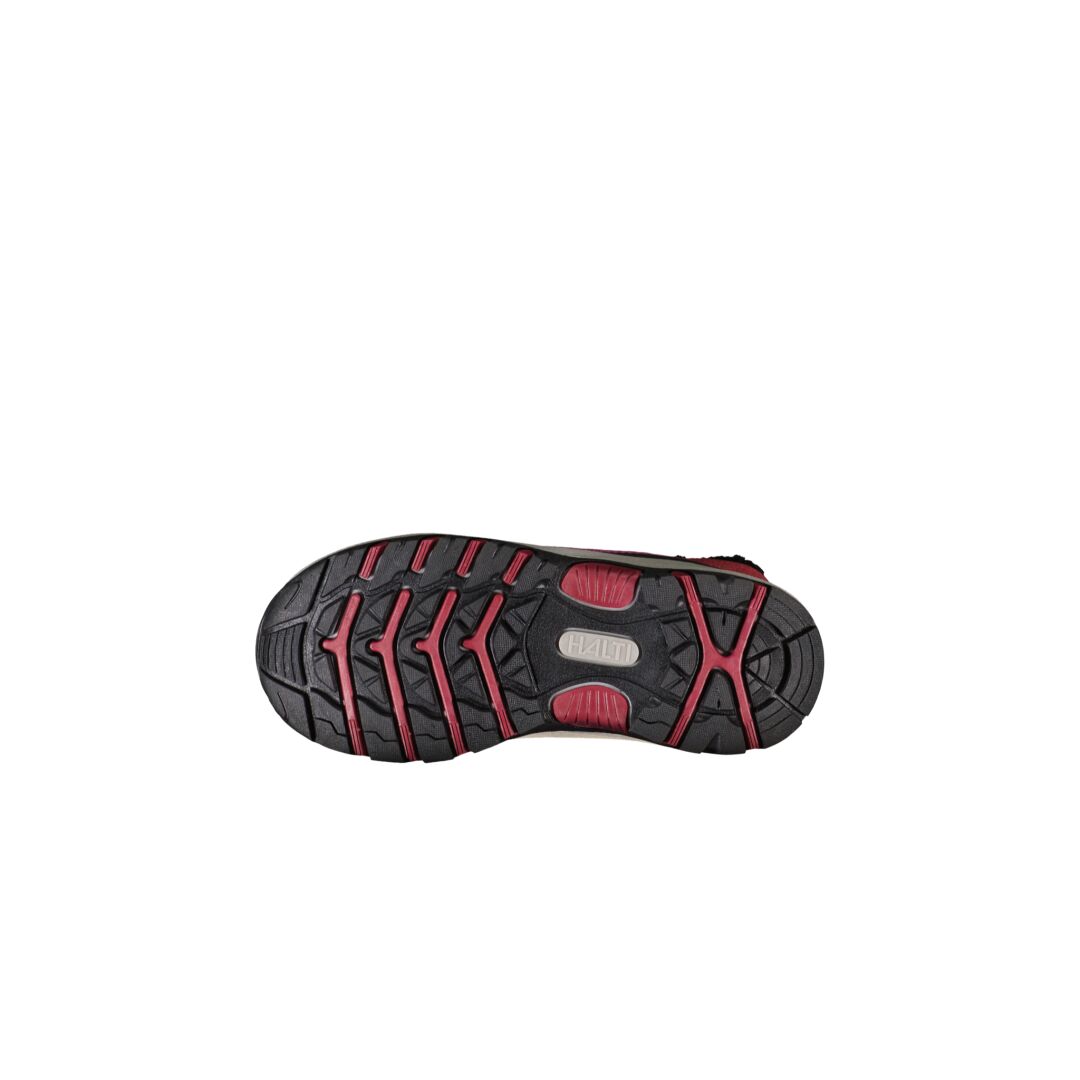 Die Halti Saga Zip Kinder DrymaxX-Schuhe haben eine schwarz-rote Sohle mit strukturiertem Griff, von unten auf weißem Hintergrund abgebildet.