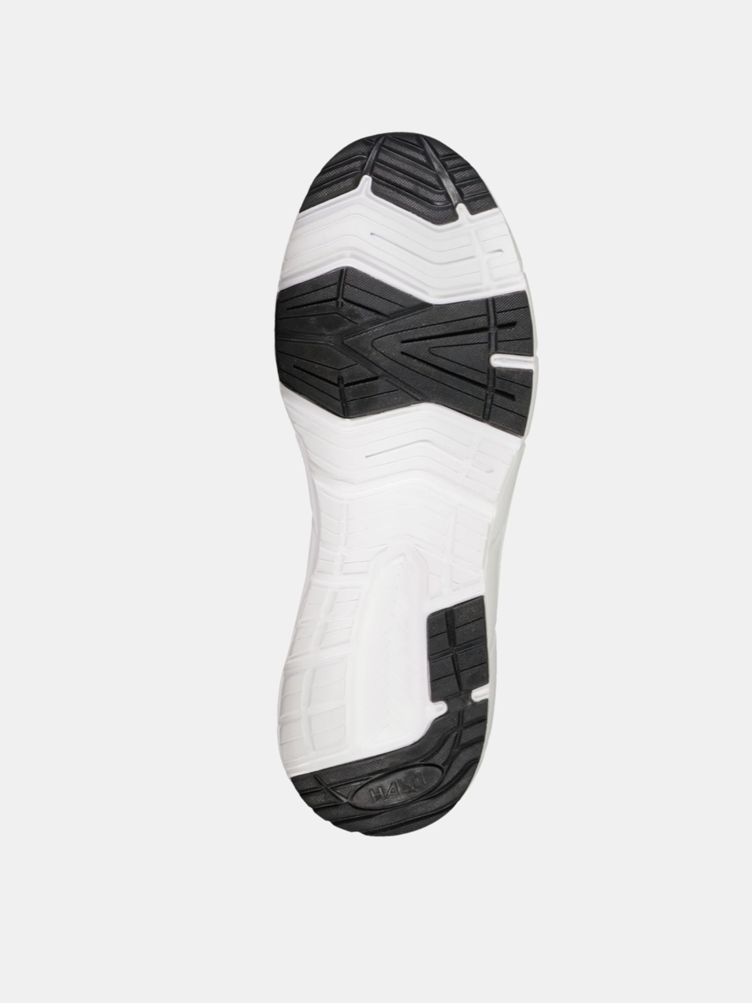 Das Bild zeigt die schwarz-weiße Gummisohle eines Halti Lester Sneaker Damen mit atmungsaktivem Obermaterial vor weißem Hintergrund.