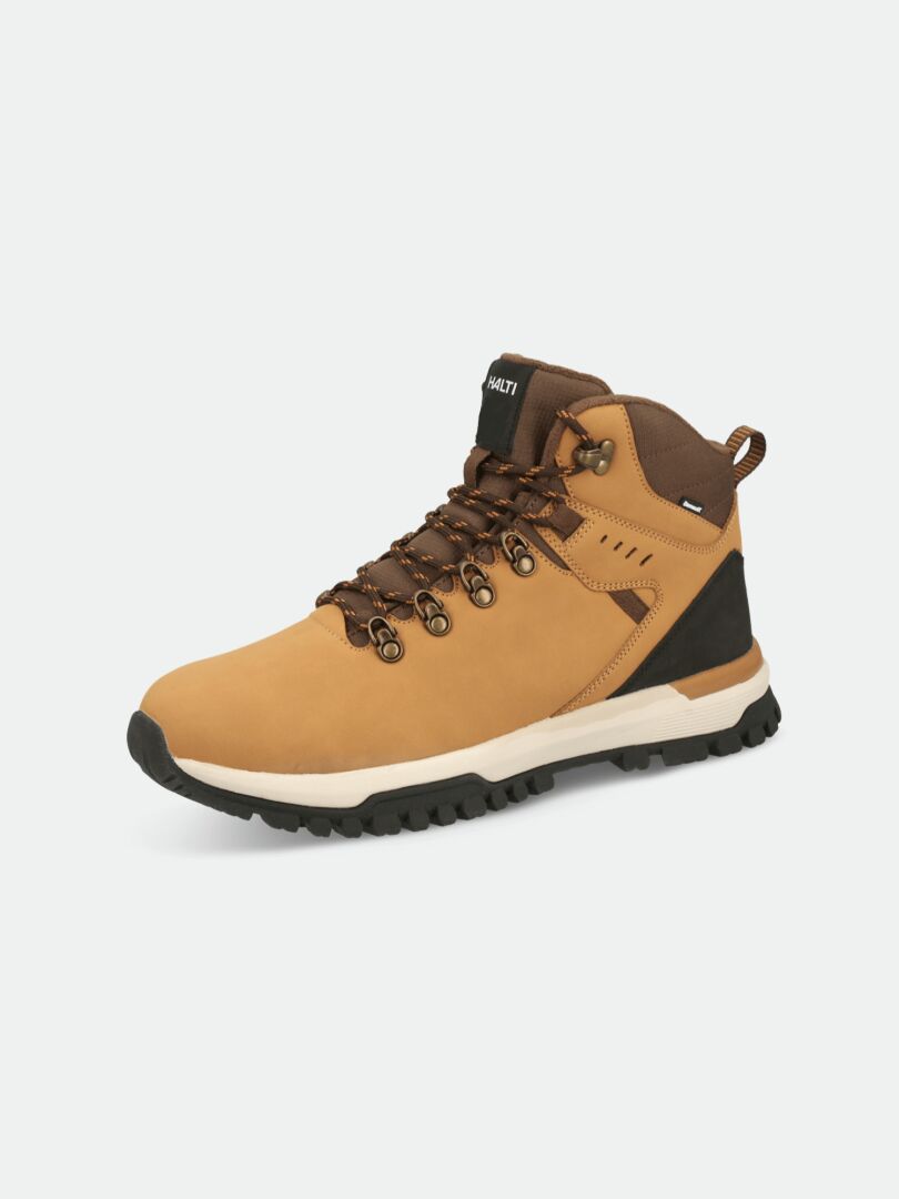 Halti Korpi DX Outdoor Schuhe Herren in tan/braun mit schwarz/weißer Sohle, Metallösen und braunen Schnürsenkeln.