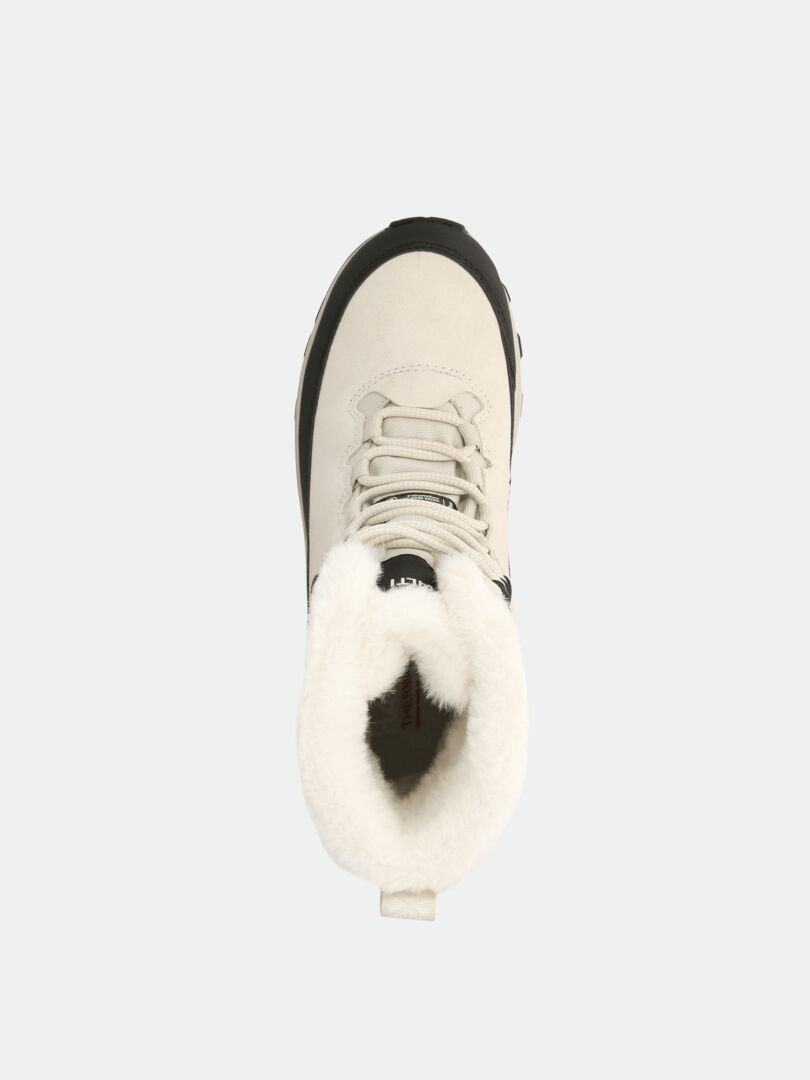 Der Halti Tornio 2 DX Winterschuh ist ein weiß-schwarzer Stiefel mit Thinsulate-Isolierung für extra Wärme.
