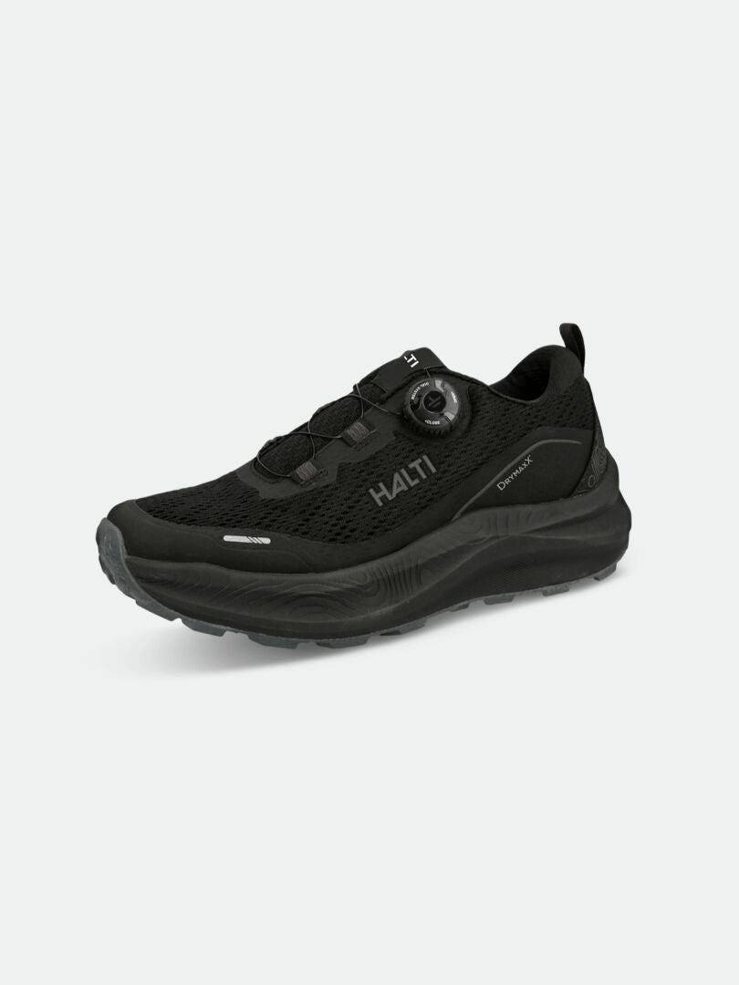 Halti Rapid DX Freelock Sneaker: schwarzes Mesh-Obermaterial, dicke Sohle, Freelock-System und Halti-Logo an der Seite.