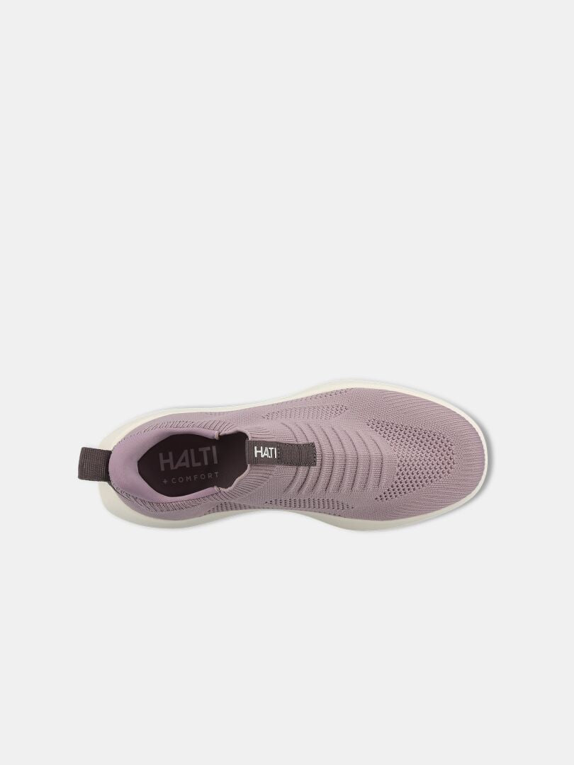 Draufsicht auf Halti Snabb 2 StepIn Sneaker Damen in mauve, weiße Sohle, StepIn-Absatz und HALTI Comfort Label innen.