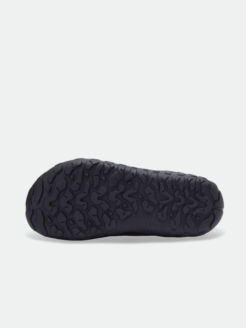 Schwarze Sohle mit gewelltem Profil für die Halti Jalava DX Barfußstiefel für Kinder, Zero-Drop, Abbildung zeigt die Unterseite.