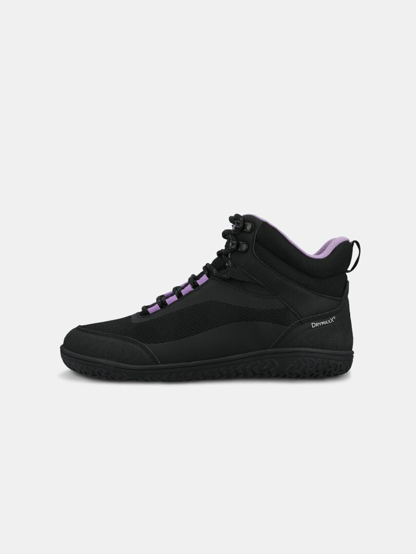 Halti Tuntuma Mid DX Barfußschuh für Damen – schwarz, mit violetten Akzenten, Mesh-Einsätzen und strukturierter Sohle – auf schlichtem weißem Hintergrund.
