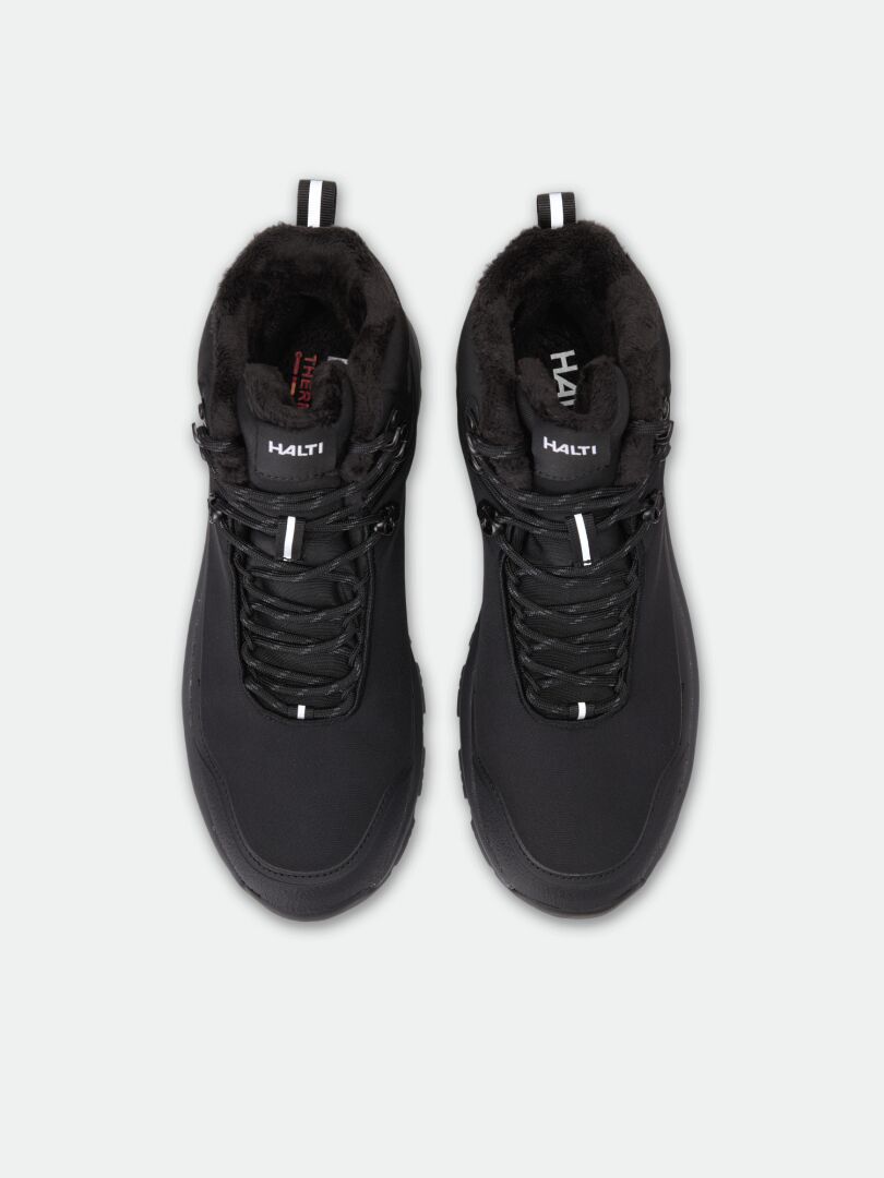 Halti Tunturi Mid DX IC Winterschuhe – Unisex-Stiefel in Schwarz, wasserdicht, mit Kunstfellfutter und Schnürverschluss.