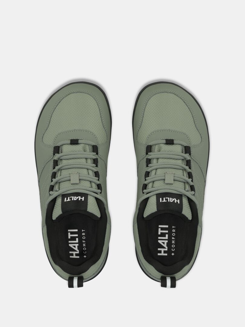 Hellgrüne „Tuntuma DX Barfußschuh Damen“-Sneaker von Halti mit schwarzen Einlegesohlen und weißem „HALTI COMFORT“-Logo.