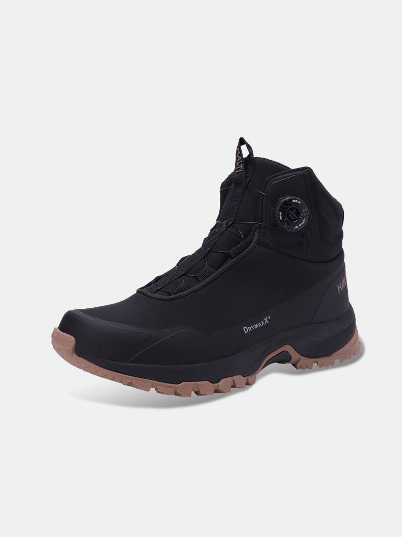 Der Halti Fara Mid 3 DX Freelock-Stiefel in Schwarz mit brauner Sohle bietet hohen Knöchelschutz auf weißem Hintergrund.