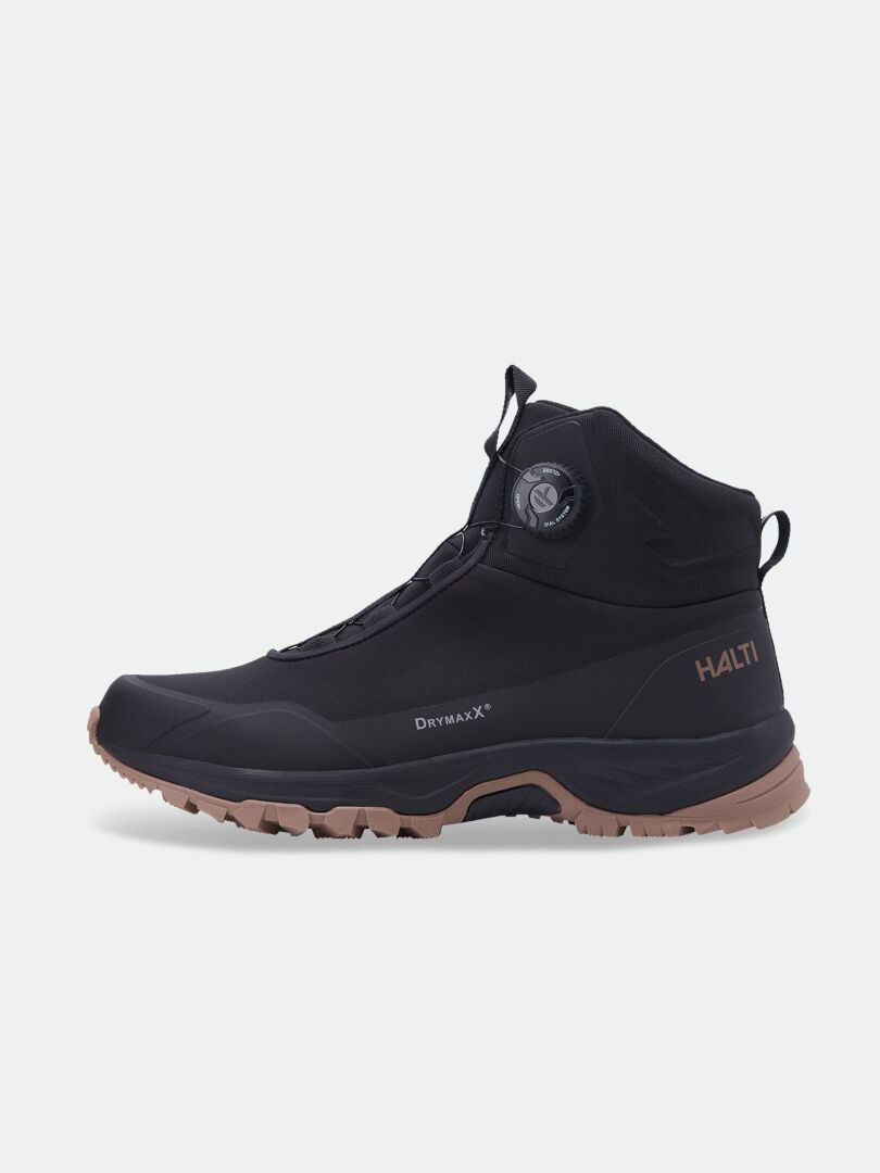 Halti Fara Mid 3 DX Freelock Wanderstiefel in Schwarz/Braun mit GripmaxX Trail-Sohle, Knöchelstütze und seitlichem Markenlogo.
