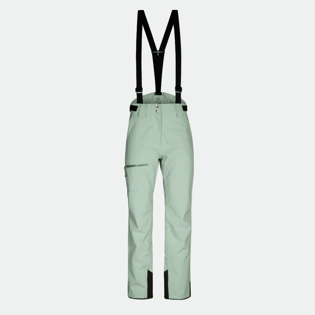 Halti Carvey DrymaxX Skihose Damen in Hellgrün mit schwarzen Hosenträgern und Reißverschlusstasche, abgebildet auf weißem Hintergrund.