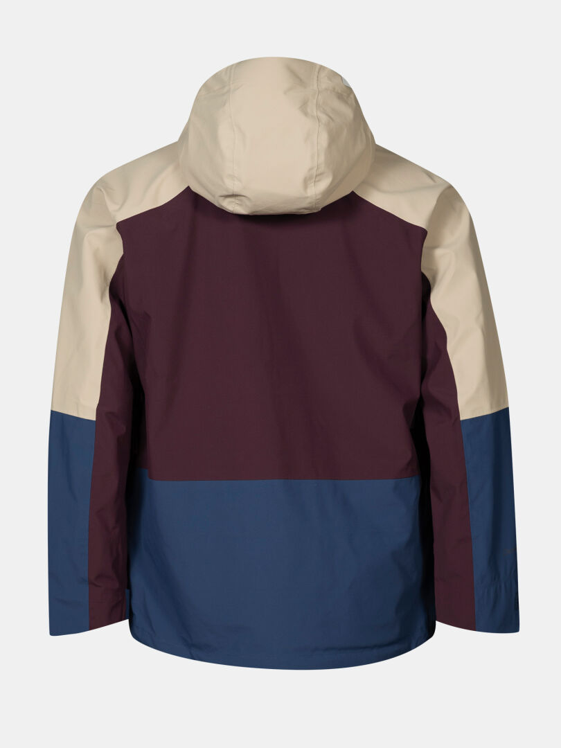 Die Halti Settler 3L DX Ski Jacke Herren hat eine beige Kapuze, einen kastanienbraunen oberen Rücken und einen marineblauen unteren Rücken.