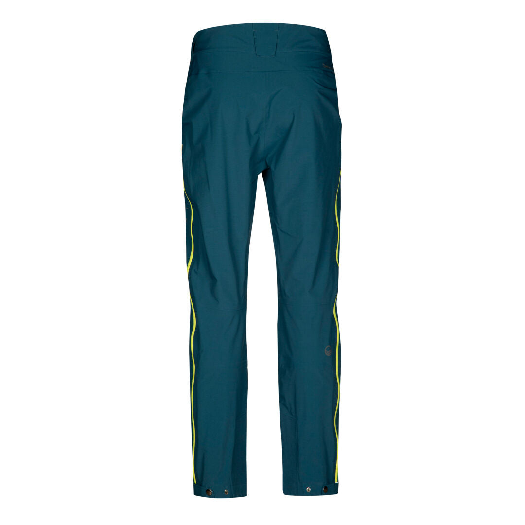 Rückansicht der Halti Alpine 3L DX Skihose Herren in teal mit gelben Streifen, zwei Taschen und Druckknopfverschlüssen am Hosenbein.