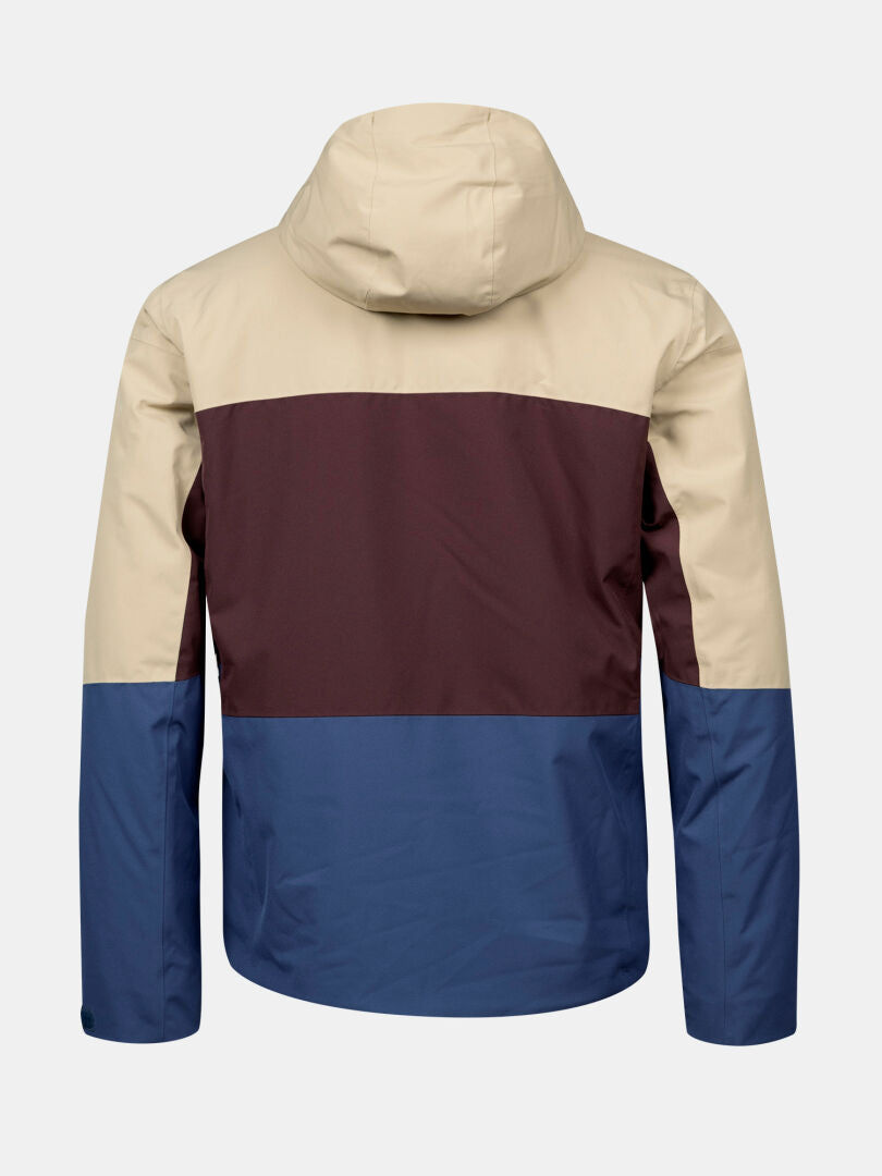 Die Halti Melvik DX Skijacke Herren ist in den Farben beige, kastanienbraun und blau gehalten, hier von hinten.