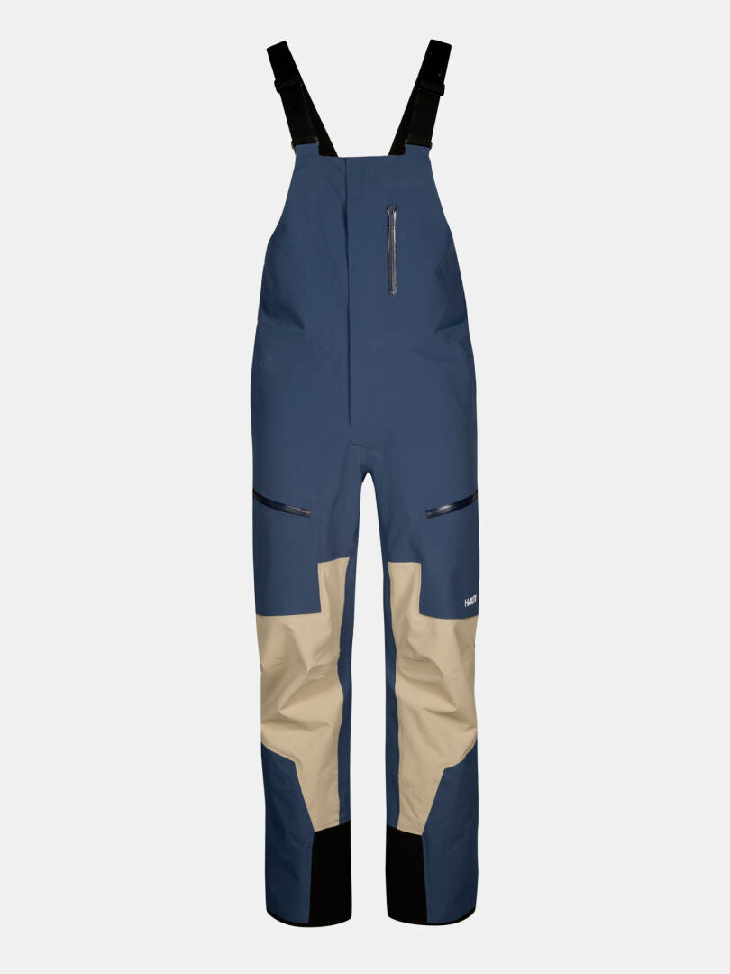 Halti Rizle 3L DX Skihose Unisex: blau/beige, wasserdicht, schwarze Träger, Reißverschlusstaschen.