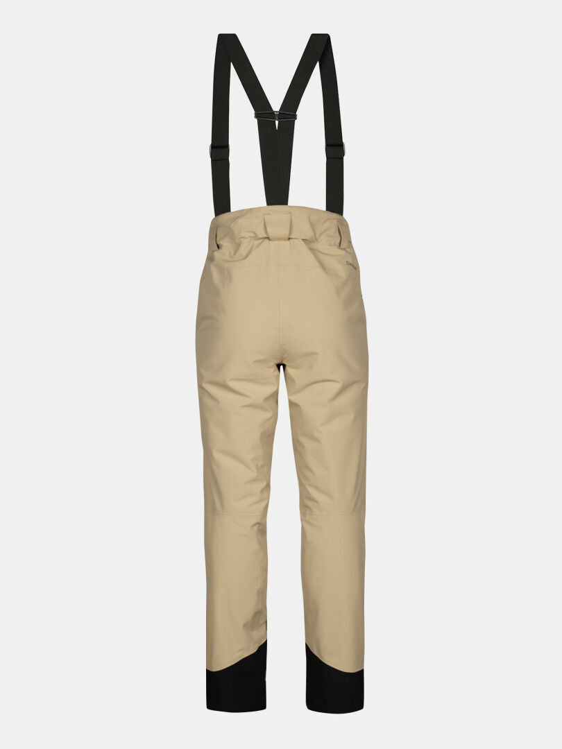Halti Carvey II DX Damen Skihose in Tan mit schwarzen Hosenträgern und DrymaxX-Bündchen, von hinten gesehen.
