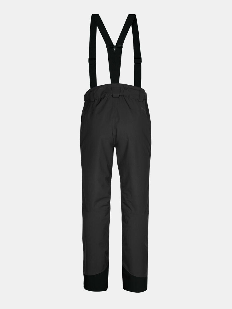 Schwarze Halti Carvey II DX Damen Skihose mit Hosenträgern, Gürtelschlaufen und verstärkten Säumen, von hinten gesehen.