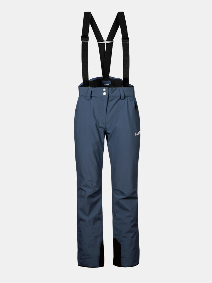 Halti Glades II DX Skihose Damen: marineblau, schwarze Hosenträger, Knöpfe vorne, Gürtelschlaufen & kleines Logo am Oberschenkel.