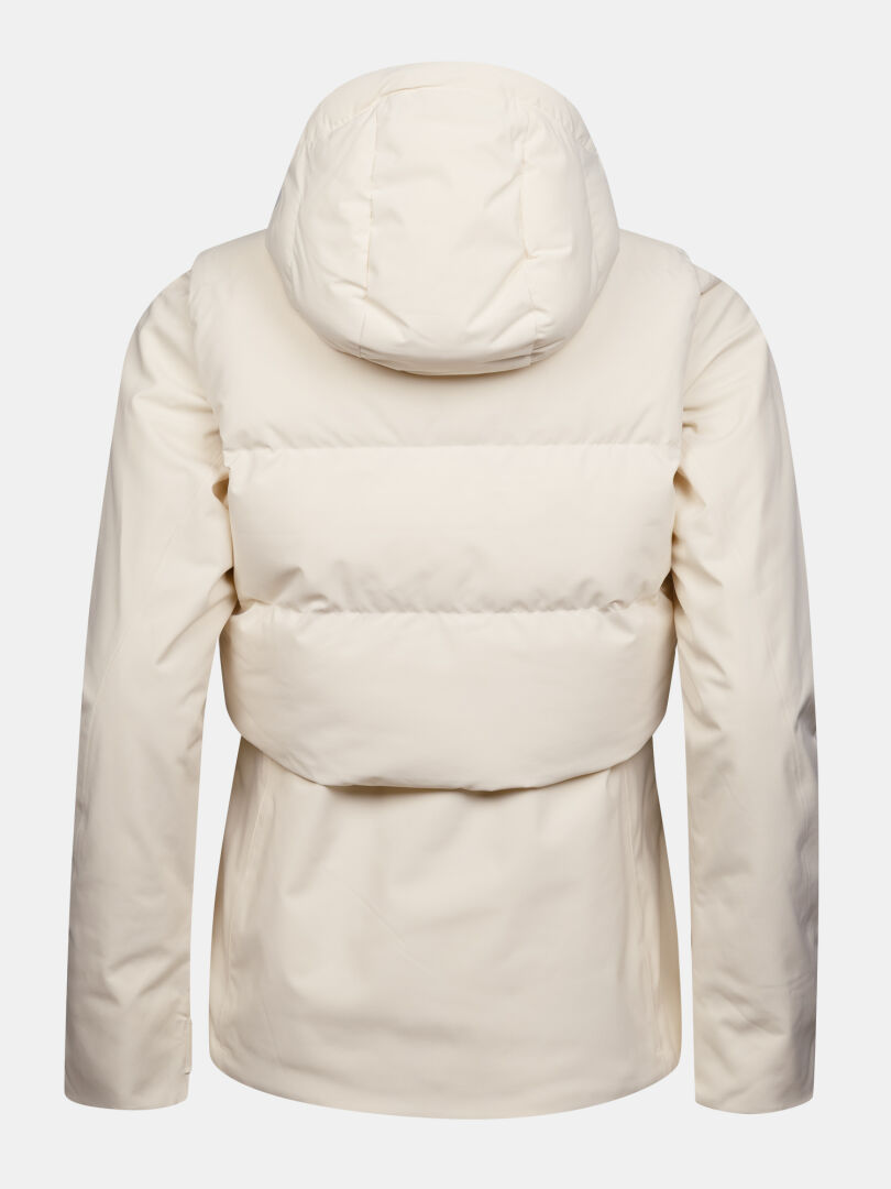 Rückansicht einer cremefarbenen Halti Varion 2in1 DX Skijacke für Damen mit einem gesteppten, mit PrimaLoft isolierten oberen Rückenbereich.
