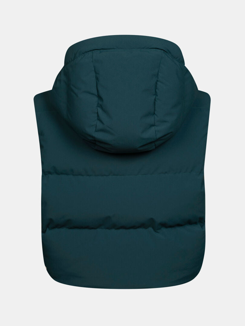 Rückansicht einer dunkelblaugrünen, mit PrimaLoft gefütterten Daunenweste mit Kapuze aus der Halti Varion 2in1 DX Skijacke für Damen.