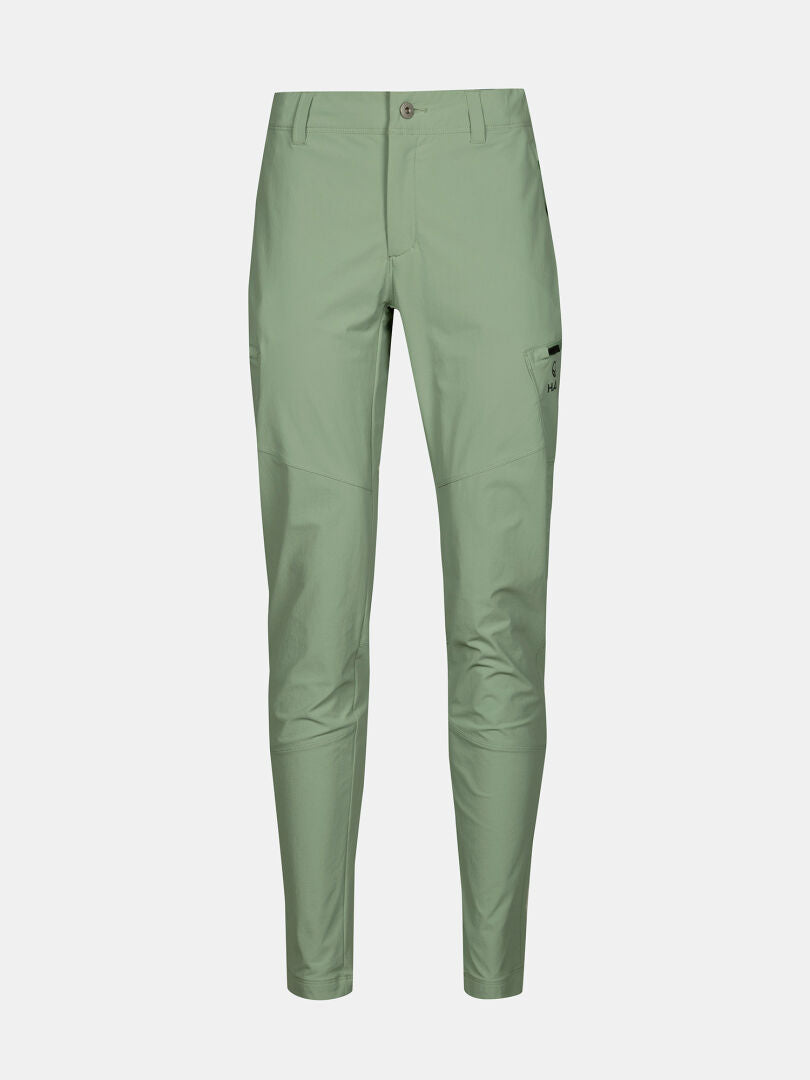 Halti Pallas Evo X-Stretch-Hosen Damen: hellgrün, schmale Passform, Fronttaschen, Seitentasche am rechten Oberschenkel.