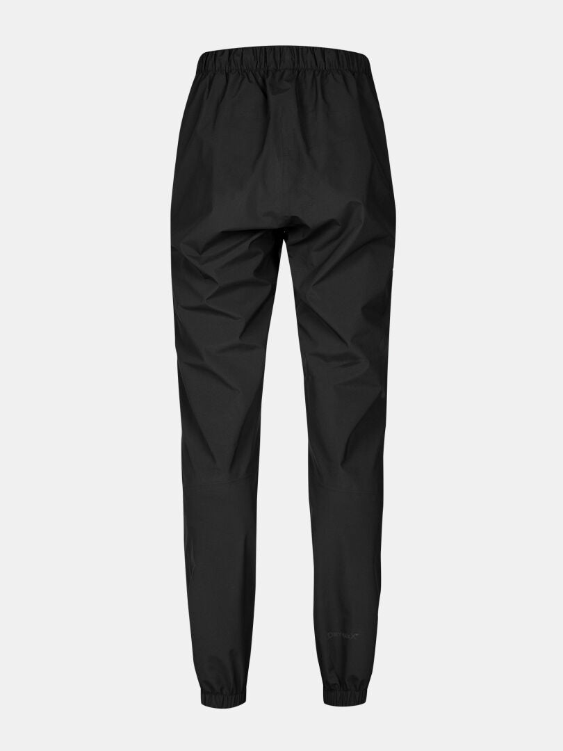 Halti Pisarat 2,5L DX Damen-Regenhose mit elastischem Bund, wetterfest, vor grauem Hintergrund.