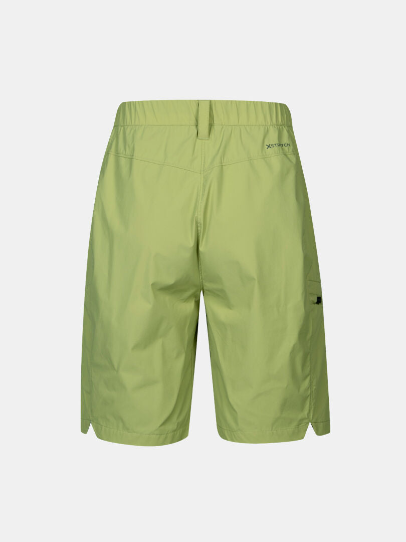 Halti Pallas Cool Shorts Damen in hellgrün mit elastischem Bund und Reißverschlusstasche hinten - ideal für Outdoor-Aktivitäten.