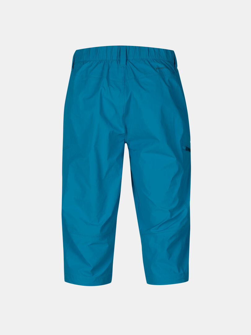 Halti Pallas Cool X-Stretch Caprihose Herren in leuchtendem Blau mit elastischem Bund, Seitentasche und LSF 90+, Rückansicht abgebildet.