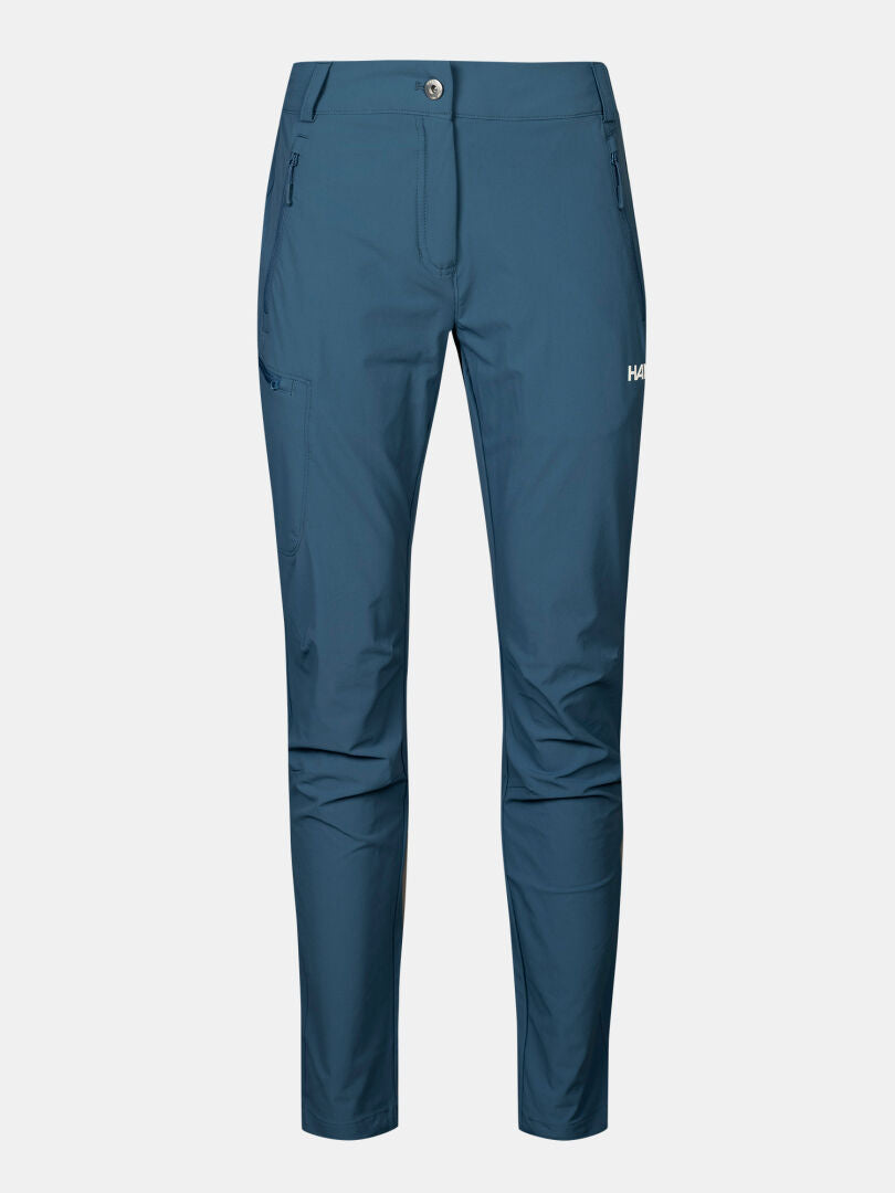 Halti Pallas X-stretch Hose Damen Plus: blau, schmale Passform, Reißverschlusstaschen, Knopfverschluss, weißes Logo, atmungsaktiv.
