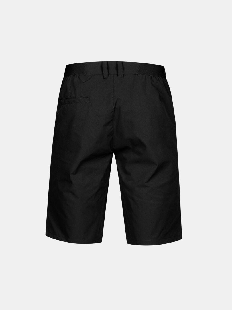 Halti Drive Stretch Shorts Herren in schwarz, knielang, von hinten gesehen mit Gürtelschlaufen und einer linken Gesäßtasche.