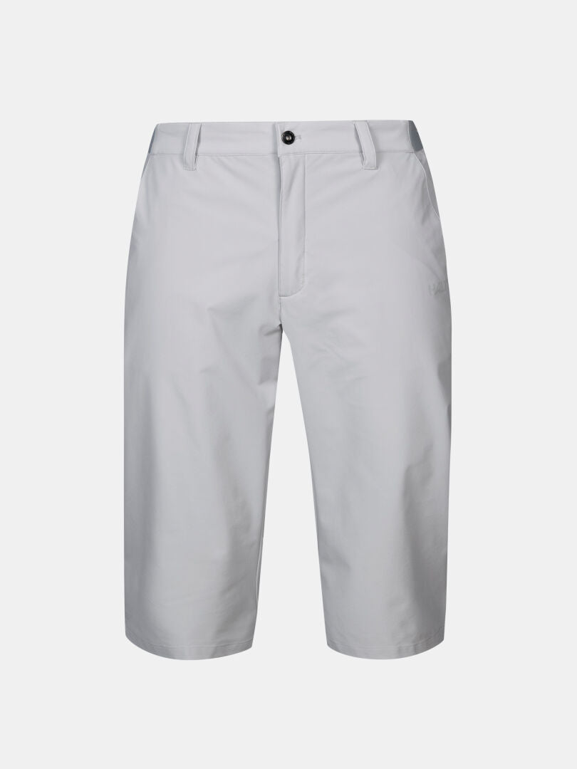 Halti Drive X-stretch Caprihose Herren, knielang mit Stretch, Gürtelschlaufen, Knopf und Reißverschluss auf weißem Grund.