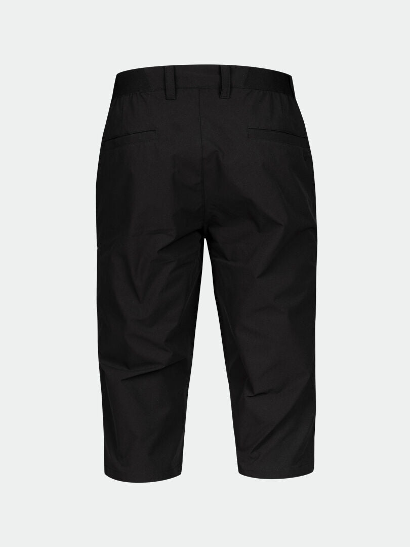 Rückenansicht der Halti Drive X-stretch Caprihose Herren, knielang, mit Gürtelschlaufen und zwei Leistentaschen hinten.