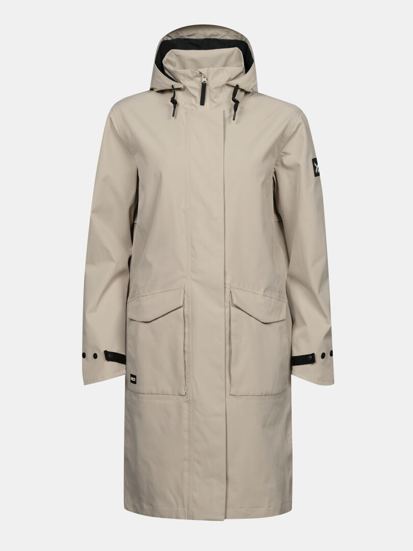 Halti Tokoi II DX Parkajacke für Damen: Beige, wasserdicht, Reißverschluss und Druckknöpfe, große Taschen, schwarze Details.