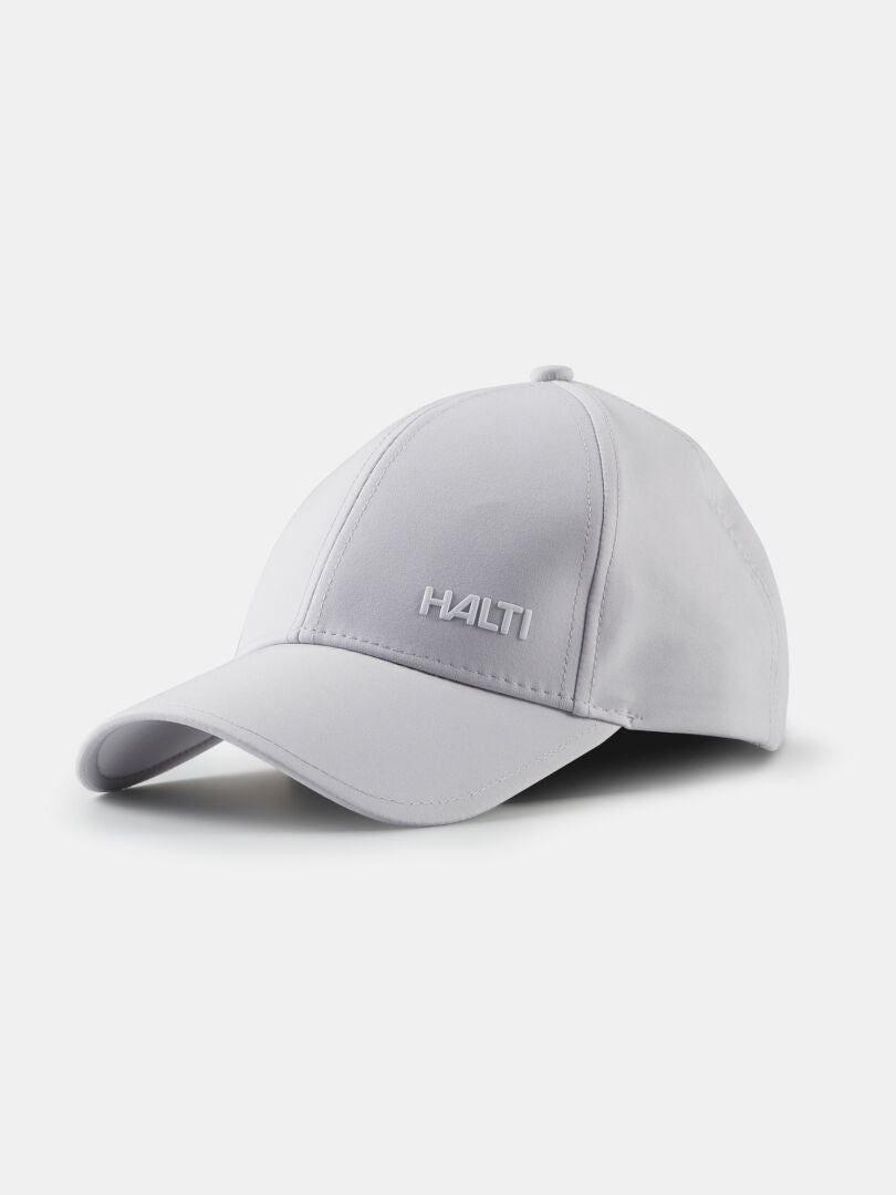 Die Mattas Baseball Cap von Halti ist hellgrau, verfügt über Quick Dry Stretch, UPF 50+ und ist vorne mit HALTI bestickt.