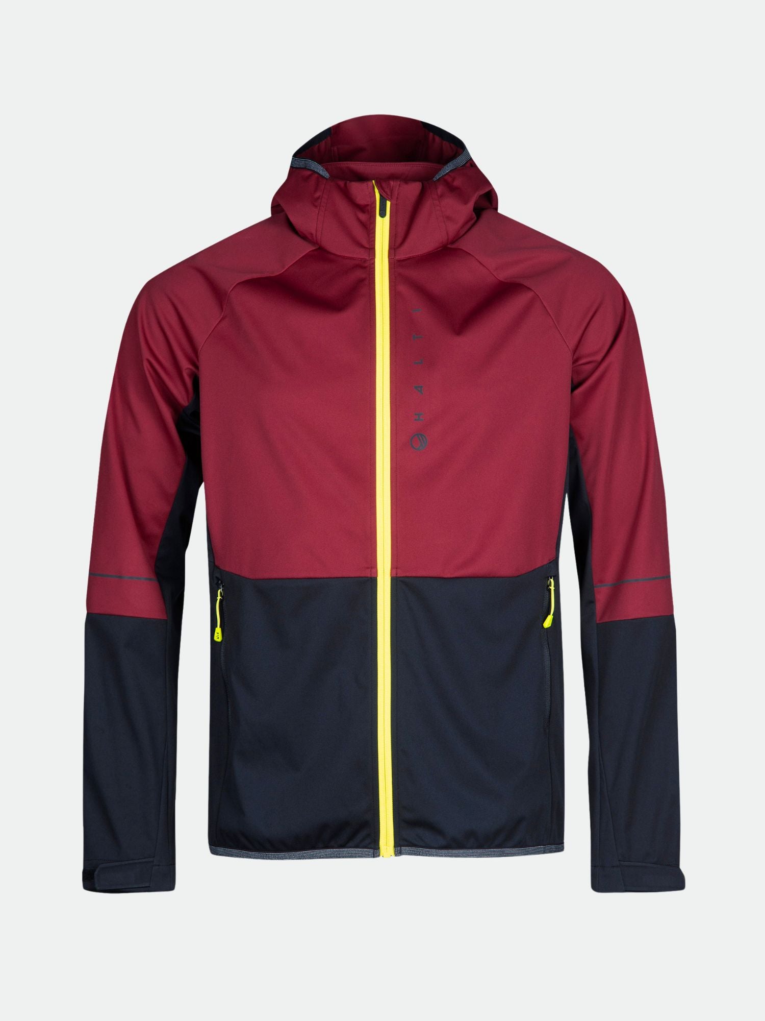 Die Halti Exhale Stormwall Jacke Herren hat einen zweifarbigen Look, Reißverschlusstaschen und reflektierende Details zum Radfahren.