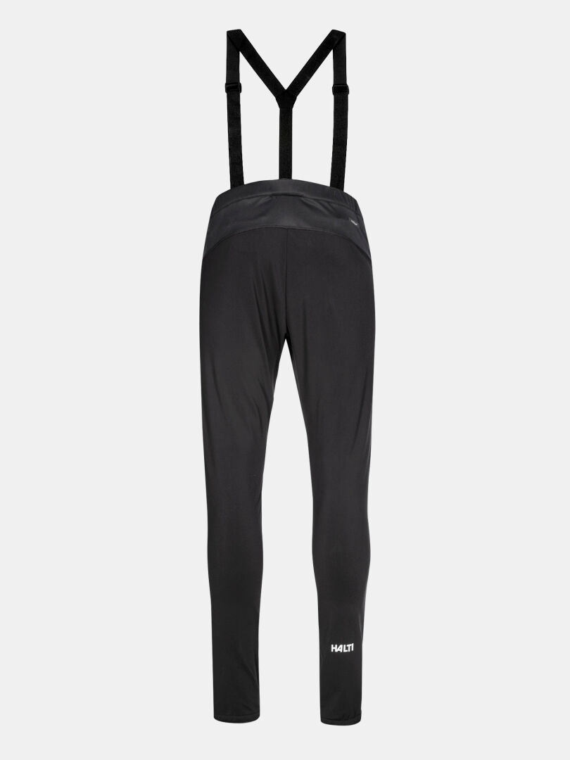 Rückenansicht von Halti Huuru Langlaufanzug Herren schwarze Hose mit Hosenträgern, ideal für das Wintertraining, Logo am Unterschenkel.