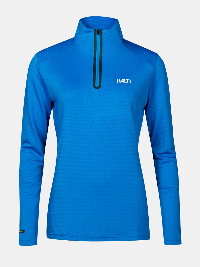 Das Halti Jaako Hemd Damen ist ein hellblauer, langärmeliger Midlayer mit halbem Reißverschluss und kleinem weißen Logo.