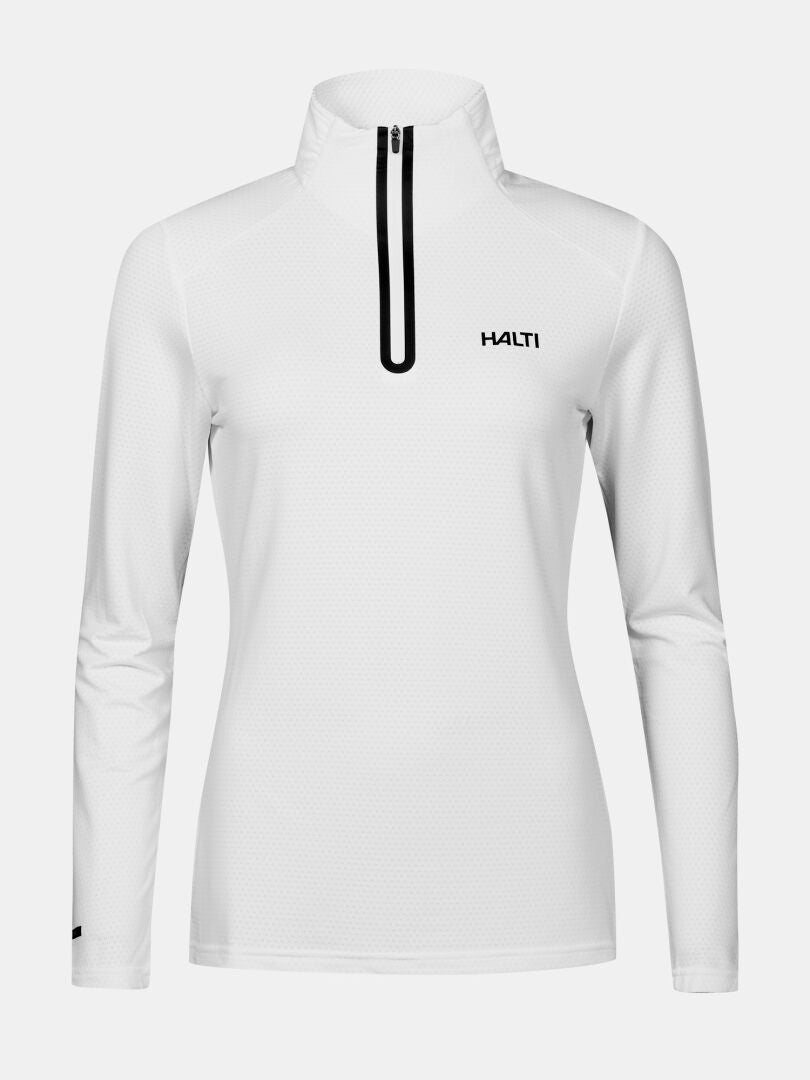 Das Halti Jaako Hemd Damen ist ein weißes langärmeliges Midlayer-Shirt mit halbem Reißverschluss und Logo auf der linken Brustseite.