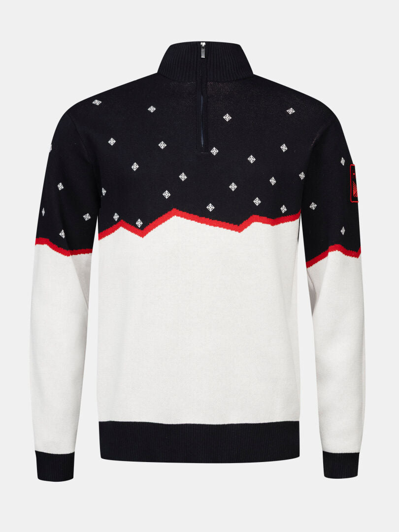 Der Halti Tauko Unisex-Pullover besticht durch seine schwarz-weiße Farbkombination sowie rote Zickzack- und Rautenmuster, die ihm einen unverwechselbaren Stil verleihen.
