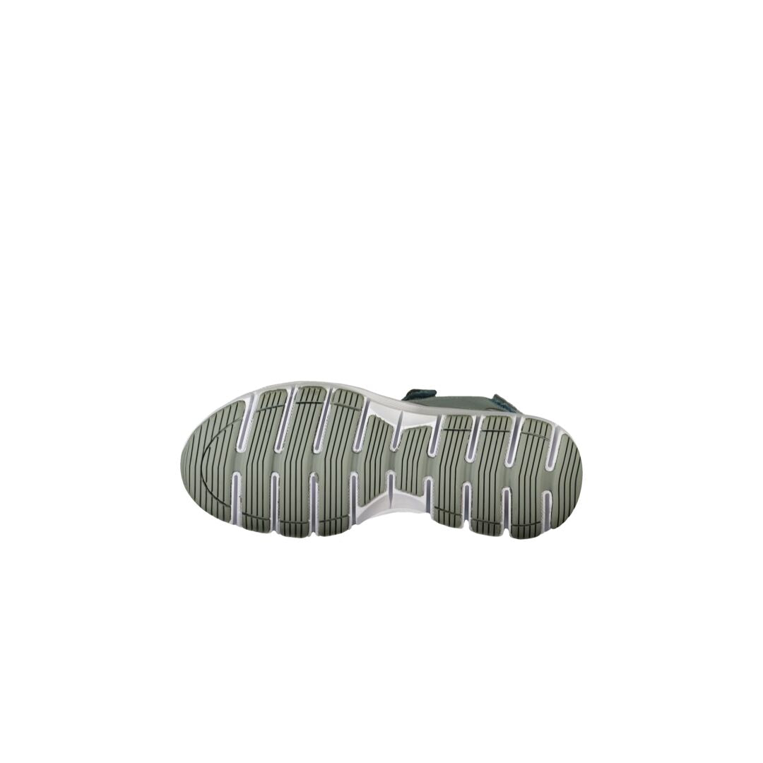 Unteransicht einer Halti Resa Damen-Sandale mit einer weiß-grauen gerillten Gummisohle, dargestellt auf einem schlichten weißen Hintergrund.