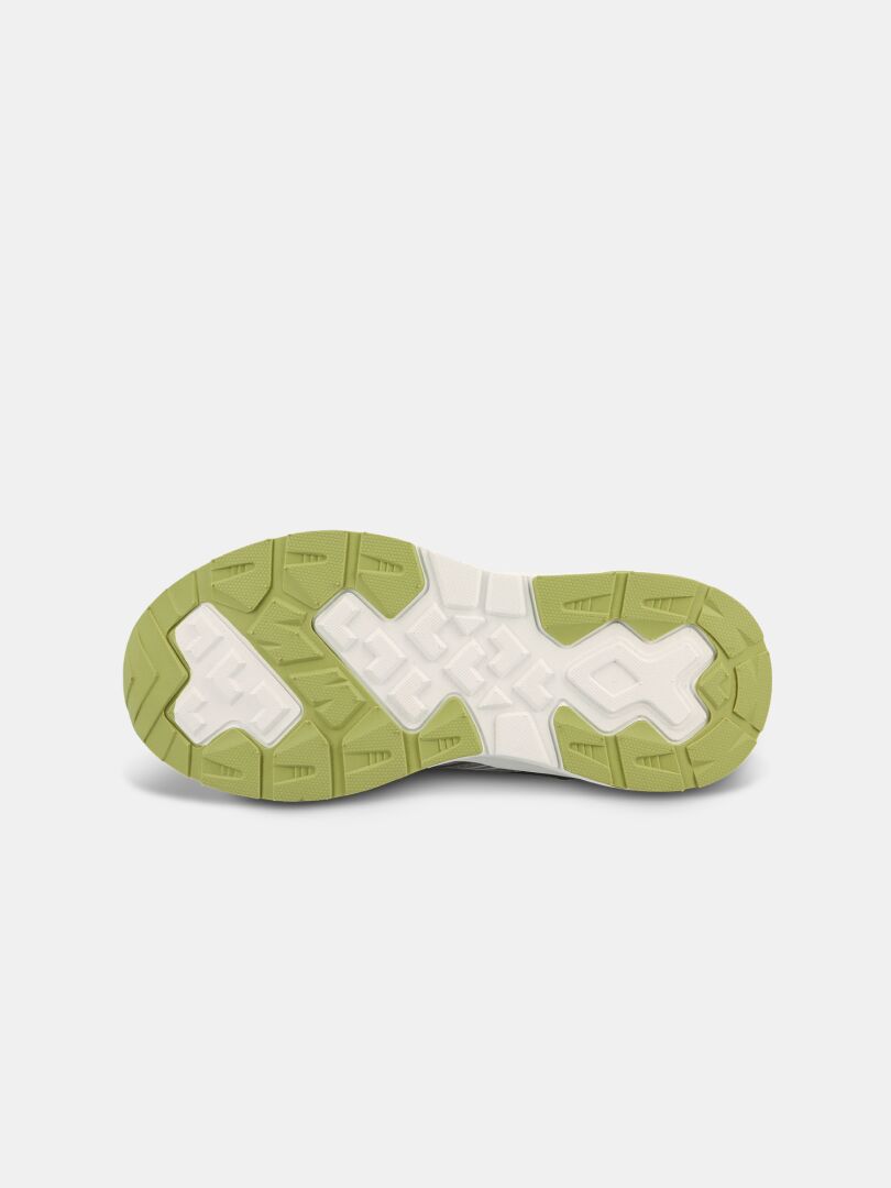 Die Unterseite des Halti Zuma 2 DX Sneaker Kinder mit einer grün-weiß gemusterten Gummisohle auf weißem Hintergrund.