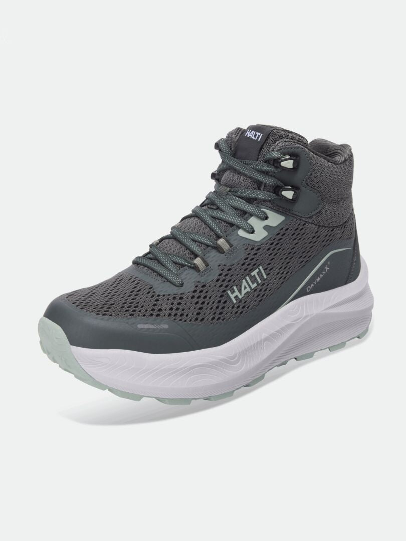 Graue Halti Rapid DX Mid Outdoor-Schuhe für Herren mit Mesh-Obermaterial, hoher Knöchelstütze, weißer Sohle und Schnürsenkeln, Hintergrund weiß.