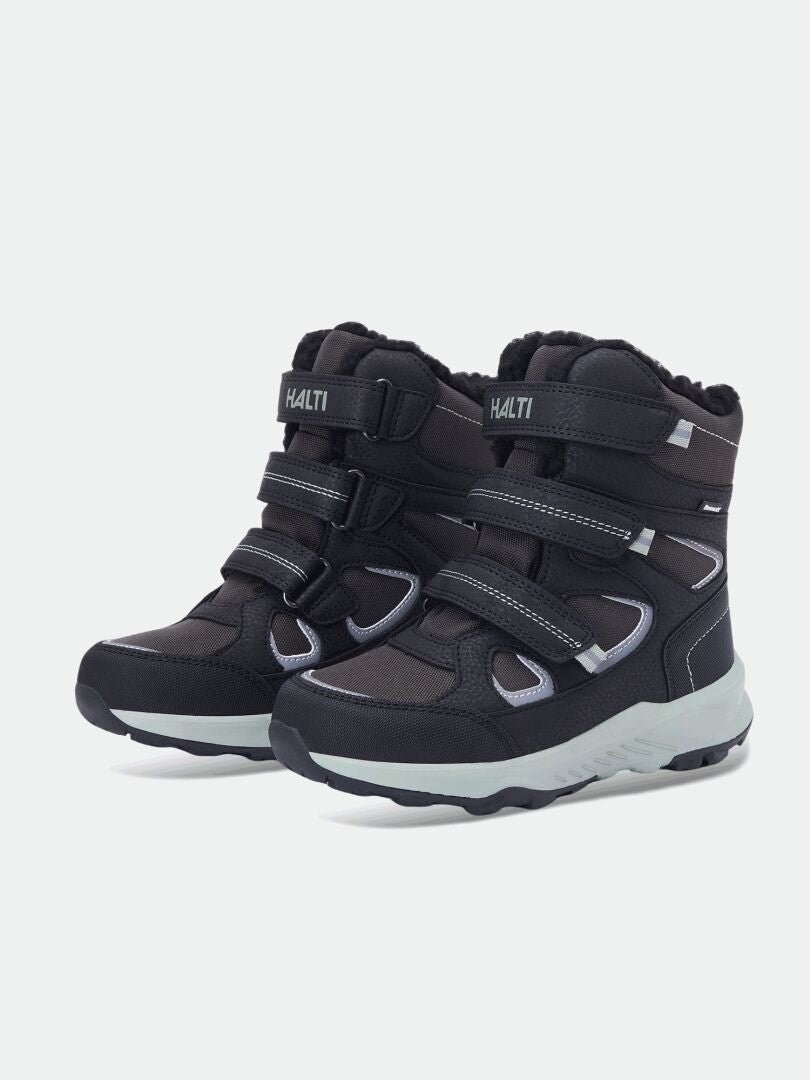 Schwarze Halti Reiss 3 DX Winterschuhe für Kinder mit grauer GripmaxX Junior-Sohle, abgebildet auf weißem Hintergrund.