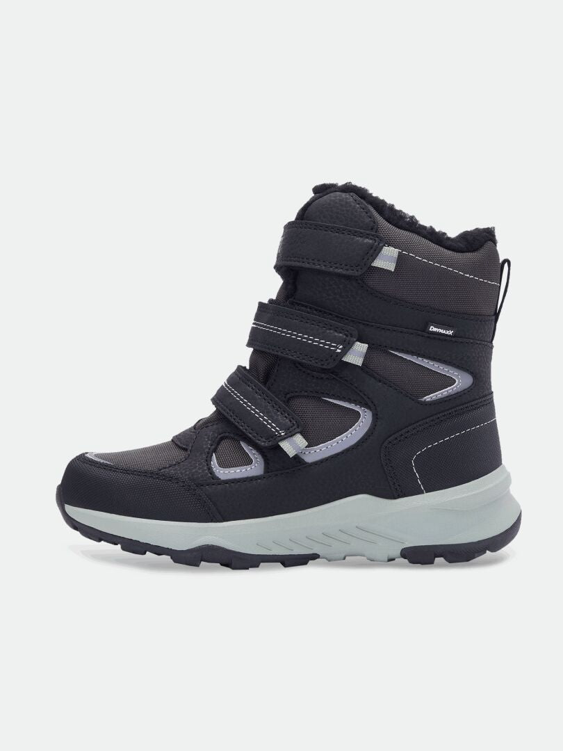 Halti Reiss 3 DX Winterschuhe für Kinder: schwarz/grau, GripmaxX-Sohle, 3 Riemen, robustes Profil, weiches Futter; Abbildung zeigt die Seitenansicht.