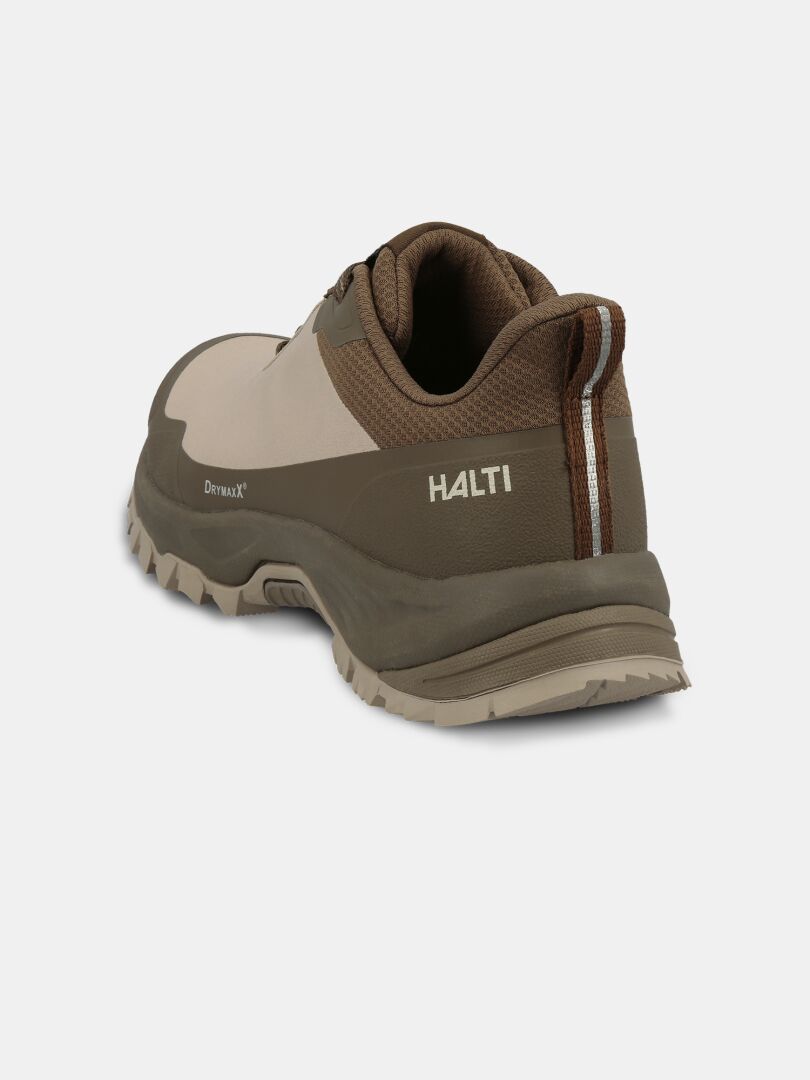 Die Halti Fara Low 3 DX Schuhe Damen, braun/beige, abgebildet von hinten mit GripmaxX Trail Sohlenbranding.