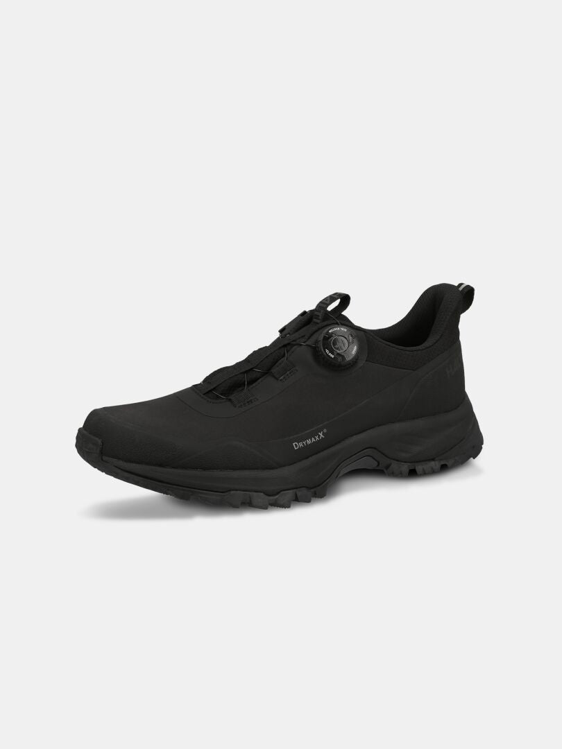 Der Halti Fara Low 2 DX Freelock ist ein schwarzer, wasserdichter Outdoor-Schuh mit profilierter Sohle, abgebildet auf weißem Hintergrund.