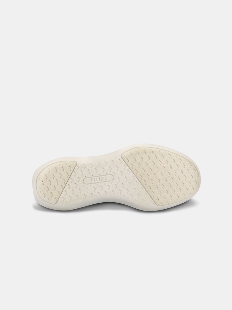 Der Halti Snabb 2 StepIn Sneaker Damen hat eine cremefarbene Sohle mit strukturiertem Profil, die von unten nach oben auf Weiß abgebildet ist.