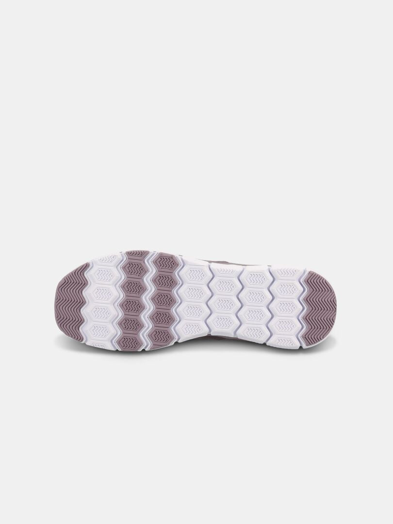 Die Unterseite der Halti Lente Canvas Schuhe Damen hat eine weiße Sohle mit sechseckigem und zickzackförmigem Profil.
