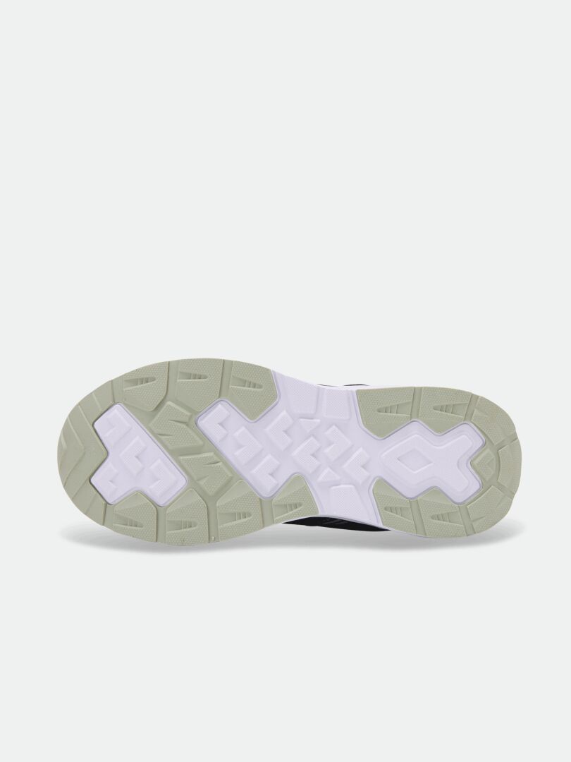 Eine Ansicht von unten des Halti Zuma Mid DX Sneaker Kinder zeigt eine weiße und beige Sohle mit geometrischen Mustern.