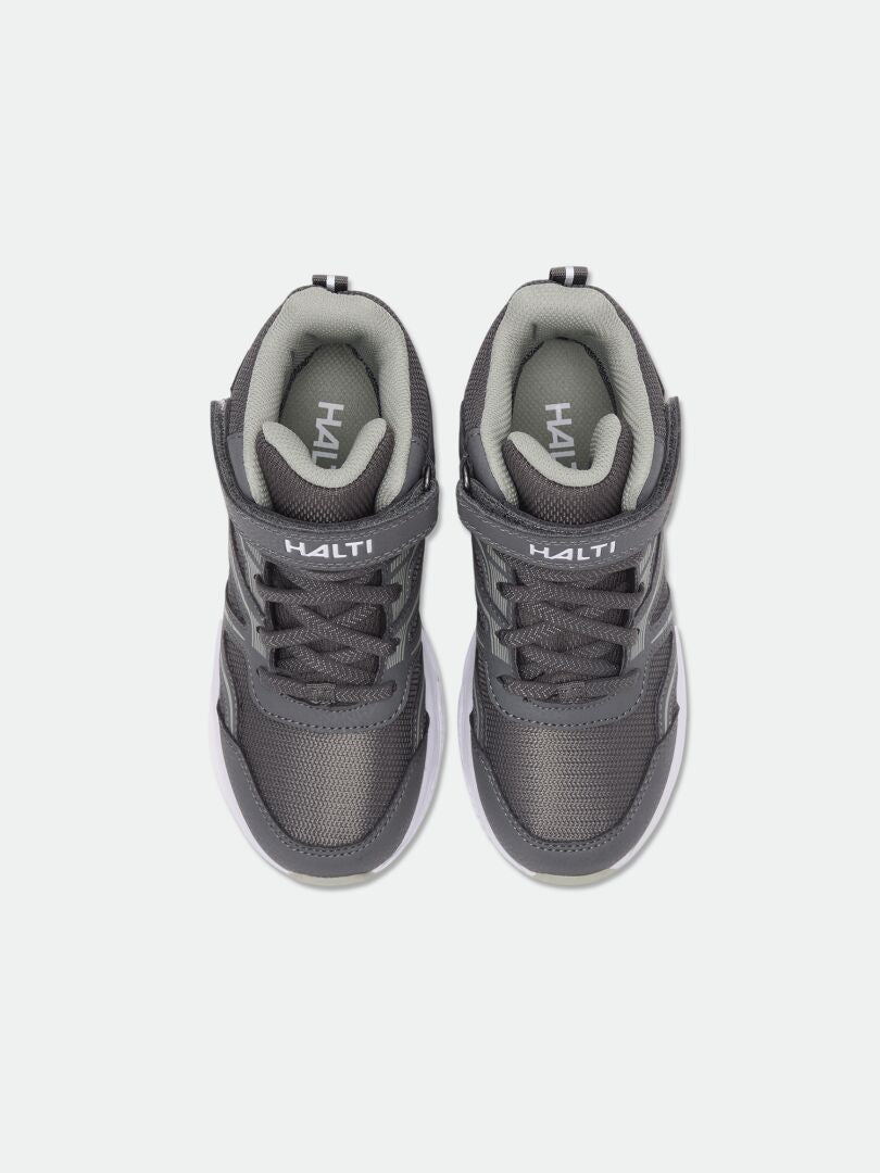 Ein Paar Halti Zuma Mid DX Sneaker Kinder in Grau und Schwarz mit Klettverschlüssen, von oben auf weißem Hintergrund fotografiert.
