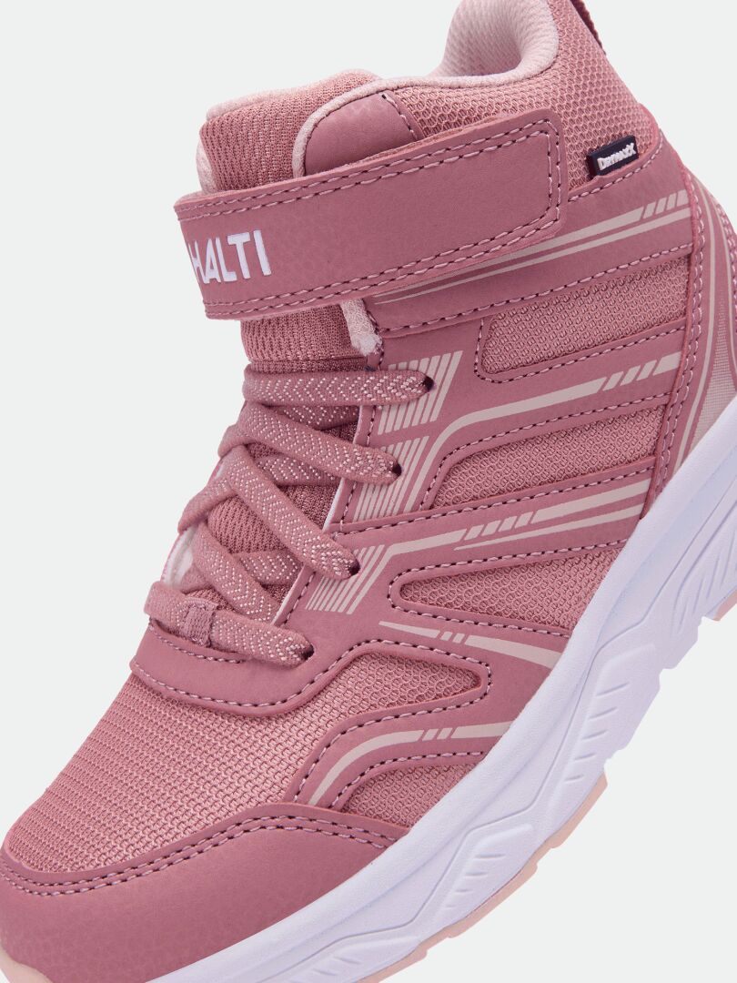 Halti Zuma Mid DX Sneaker Kinder: rosa High-Top-Kinderschuh mit strukturierten Einsätzen, weißer Sohle und Klettverschluss.