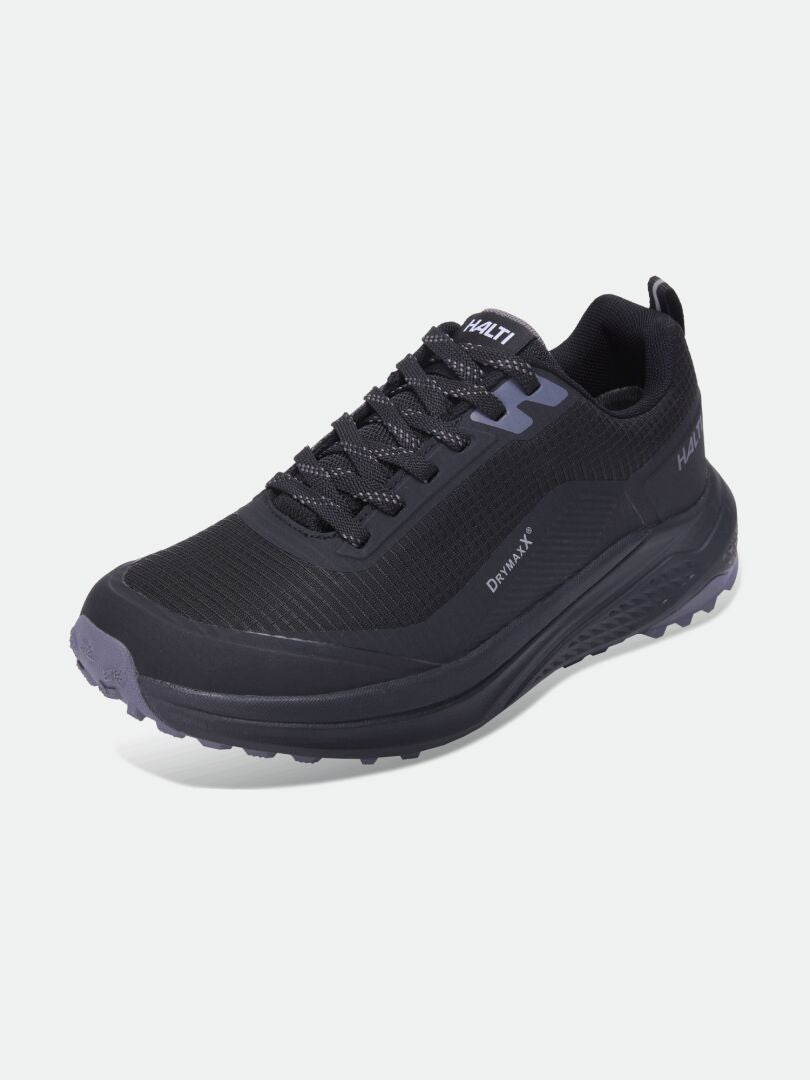 Ein einzelner schwarzer Halti Asento DX Damen-Outdoorschuh mit dicker Sohle, schwarzen Schnürsenkeln und Halti-Logo auf der Zunge und an der Seite.